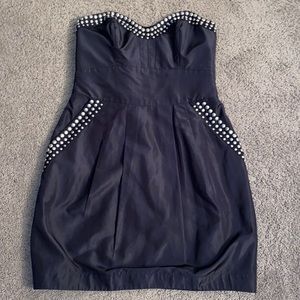 ABS black strapless dress with pockets, silver studs and zipper in back